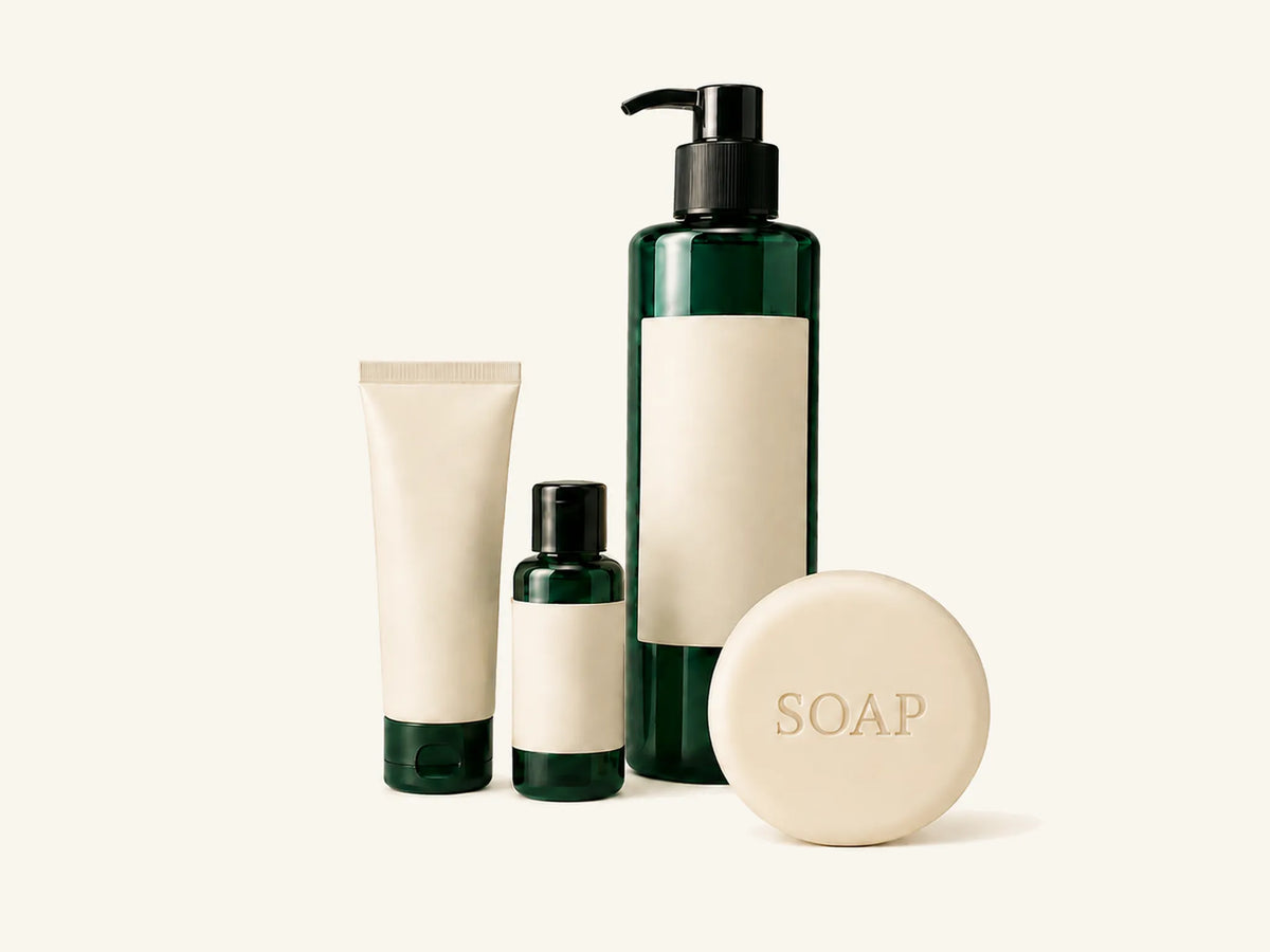 Private-label guest-size amenities and dispenser including tube, bottle, pump dispenser and round soap
